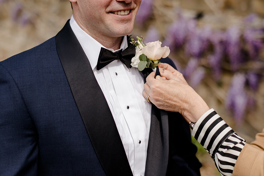 Groom with flowers on his jacket