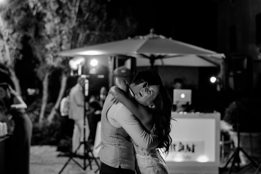 bride and groom embracing each other at Tenuta di Pratello Country Resort