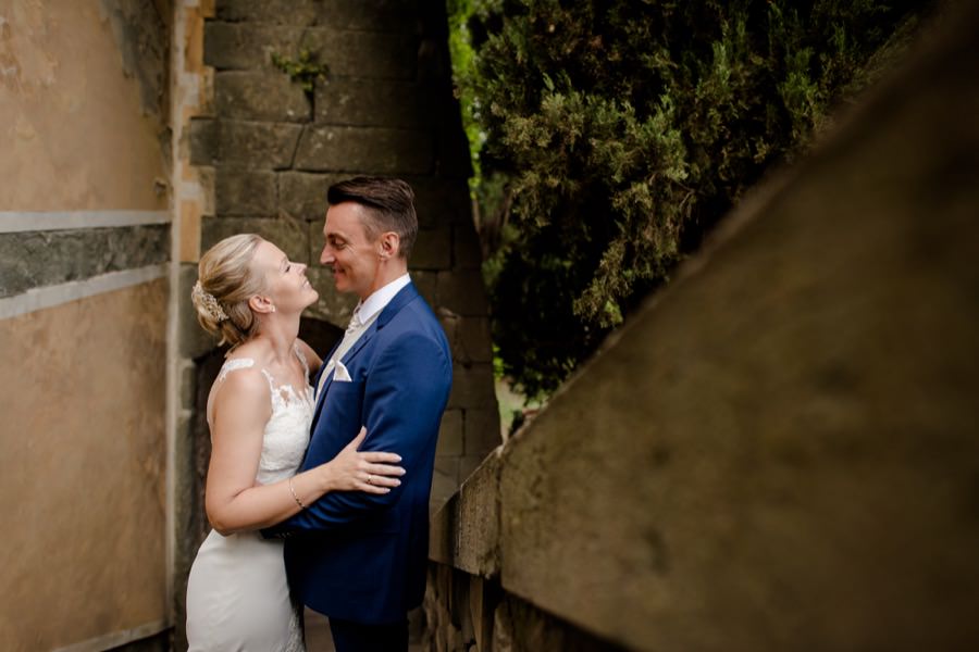 beautiful wedding couple at montegufoni castle