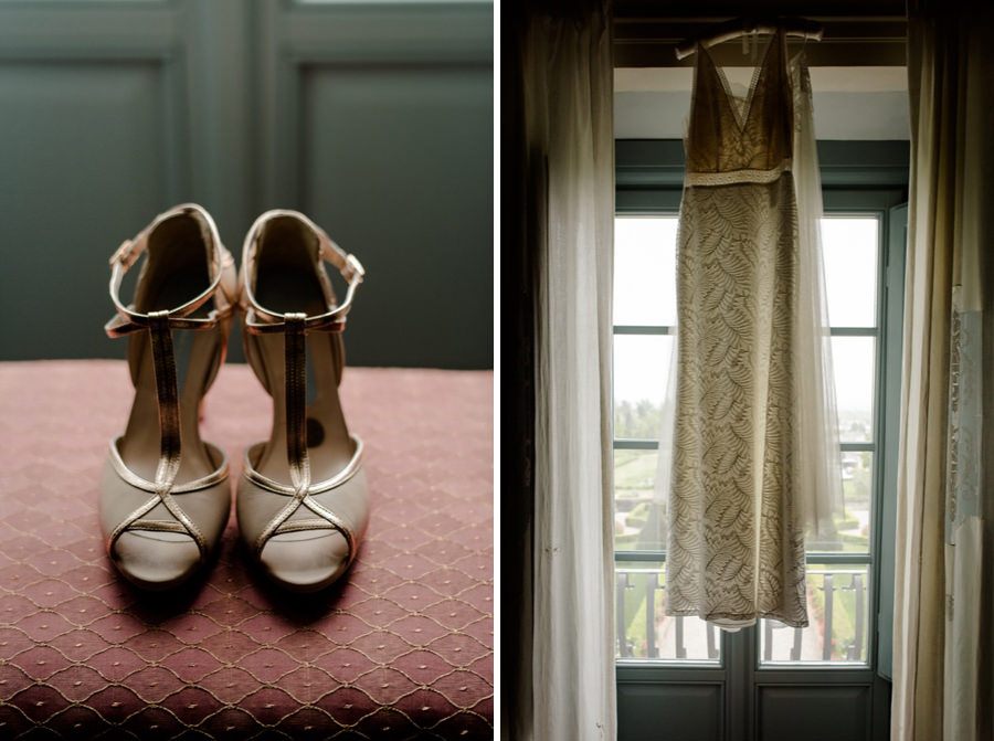 wedding shoes and bridal dress hanged on the top of the window