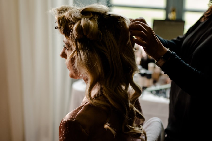 hairdress of the bride during the getting ready