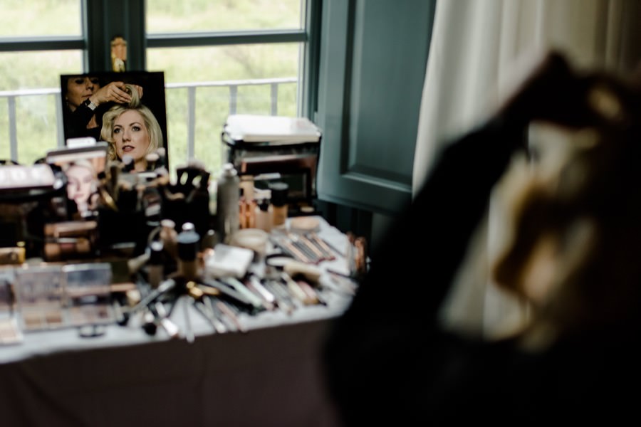 bride inside the mirror during the getting ready