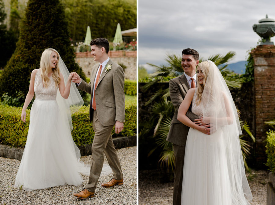 bride and groom walking together in the italians gardens of Villa Daniela Grossi in Lucca