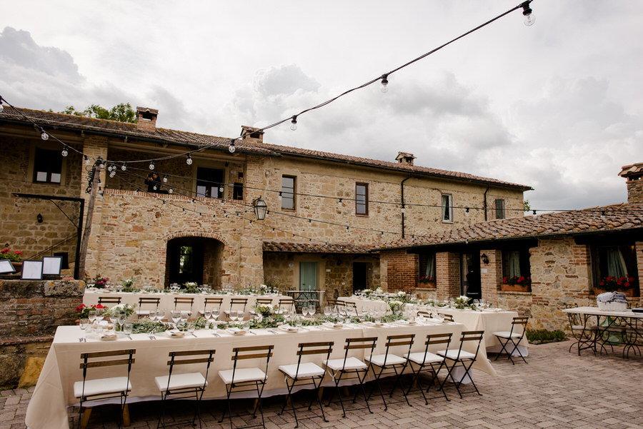 tuscan farmhouse with wedding dinner table setup