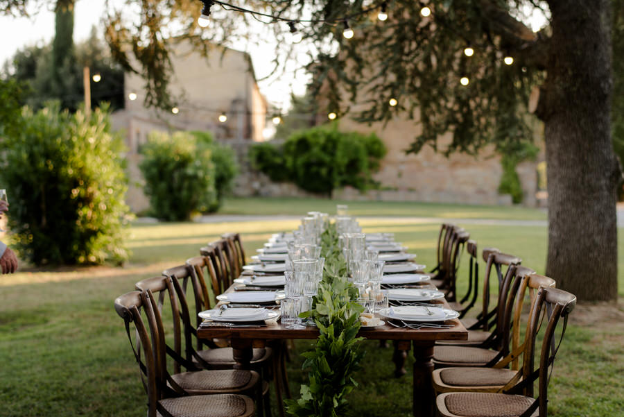 wedding dinner alfresco with greenery