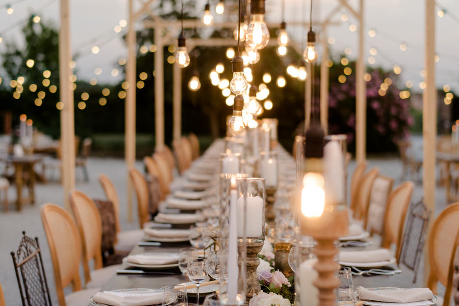 candles and lights for an outdoor wedding table in tuscany