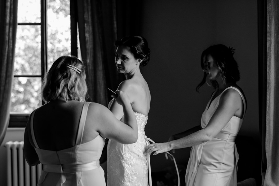 getting ready of the bride black and white photo