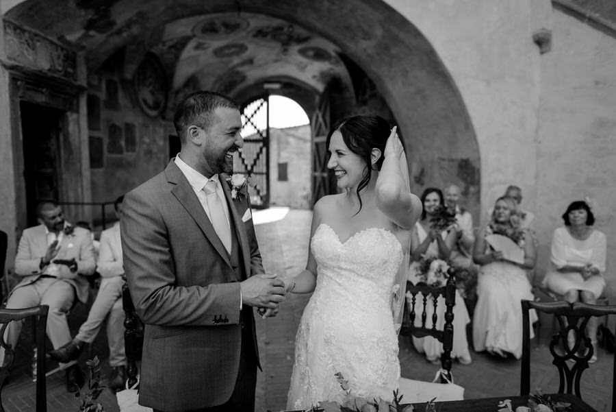 bride and groom wedding ceremony black and white