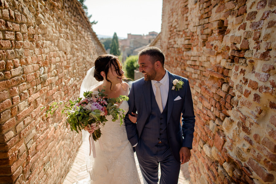 wedding couple walking together in Certaldo