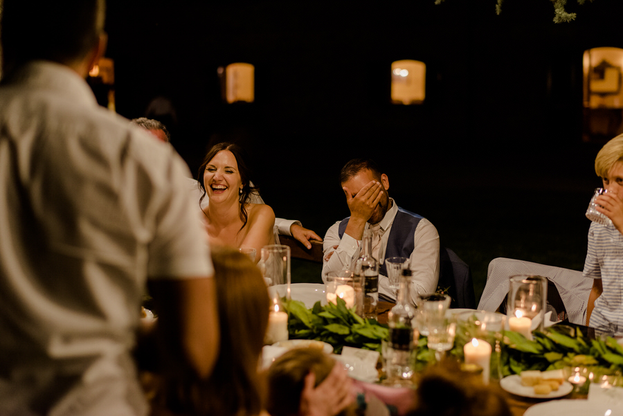 candid moment during the wedding dinner