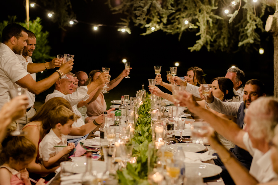 cheers during the wedding dinner