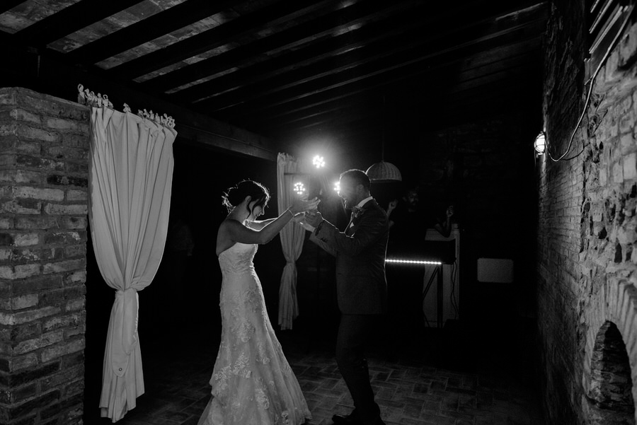 bride and groom first dance black and white photo