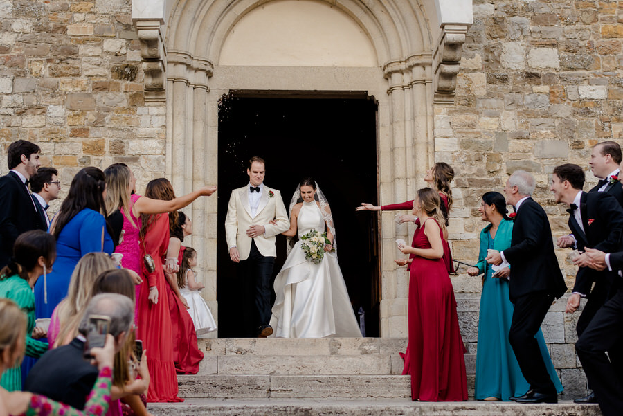 here come the bride and groom