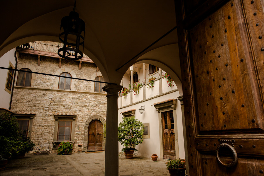 courtyard of castello di vicchiomaggio tuscany