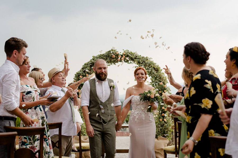 throw of confetti during a wedding ceremony in tuscany