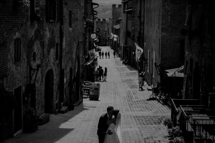 A couple kissing in Certaldo Tuscany