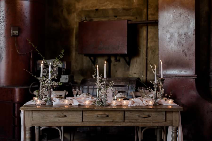 industrial chic wedding style in tuscany dinner table setting