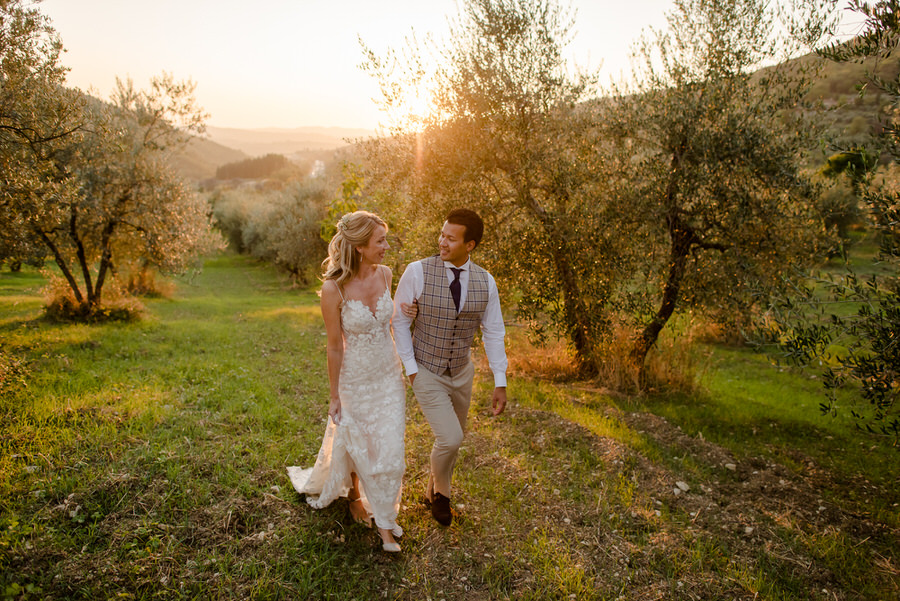 A romantic couple walking at Borgo i Vicelli Florence