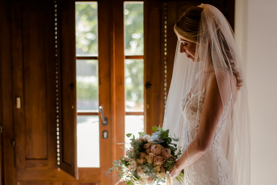 bride with her wedding dress just before the ceremony in tuscany