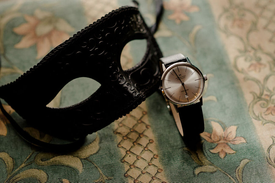 black mask and watch for groom