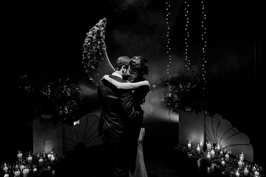 wedding couple in a theather intimate moment in tuscany black and white