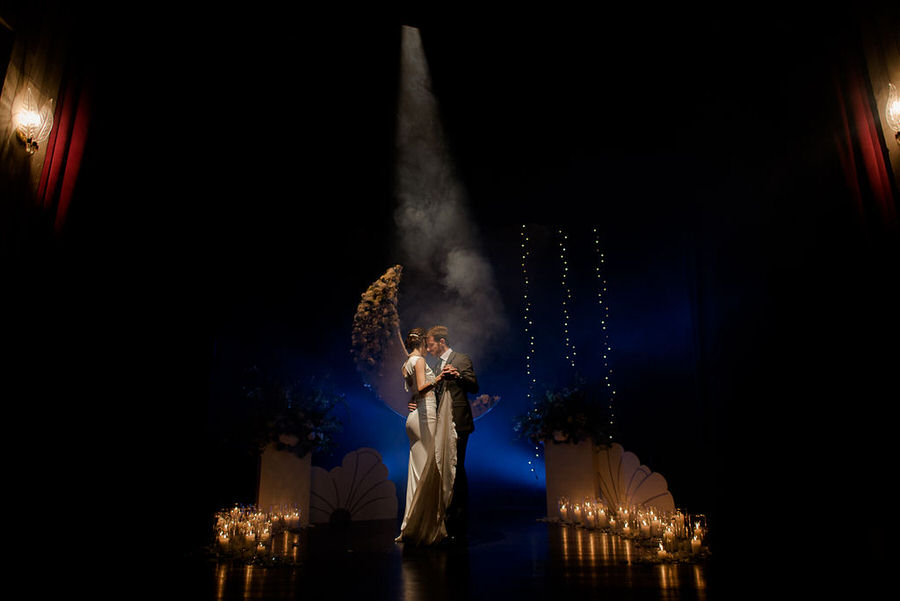 bride and groom dancing in a theather in tuscany