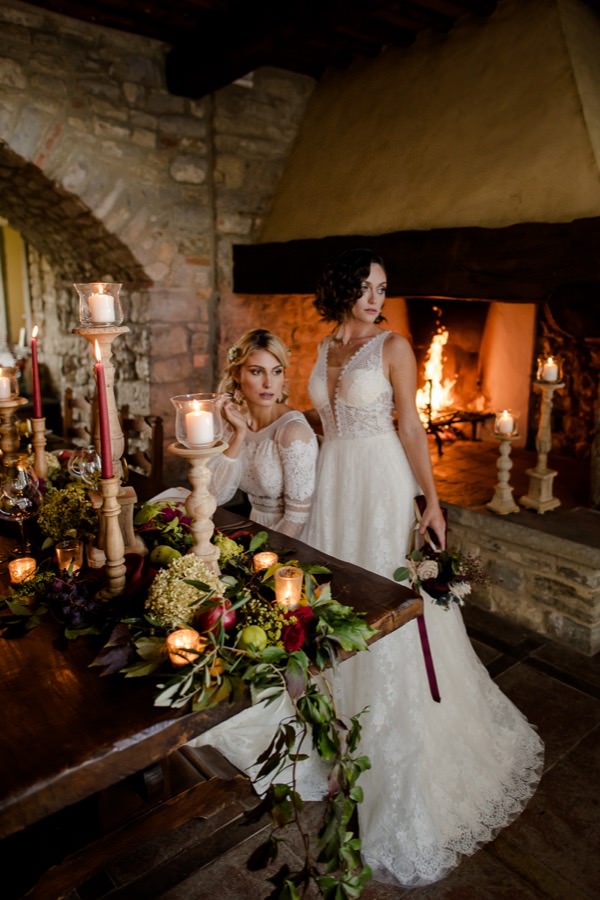 wedding couple in tuscany with fireplace