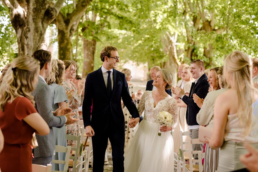 smiling couple just married in tuscany